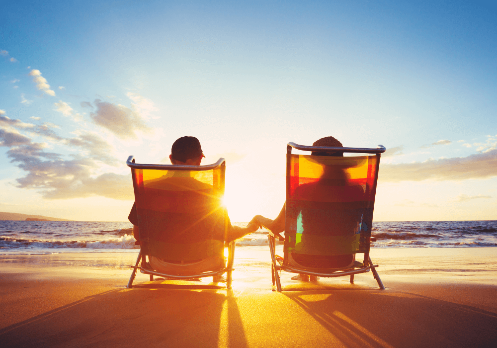 senior couple enjoying the sunset retirement bucket list ideas