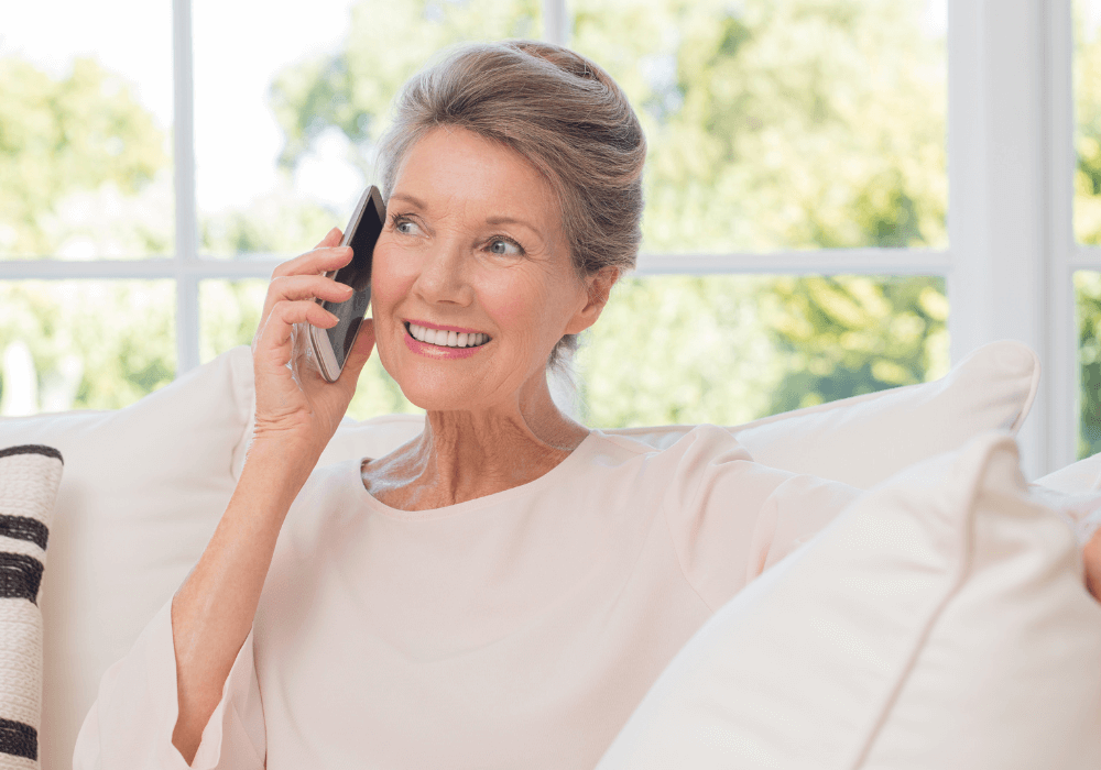 senior woman talking in the phone best cordless phones for seniors