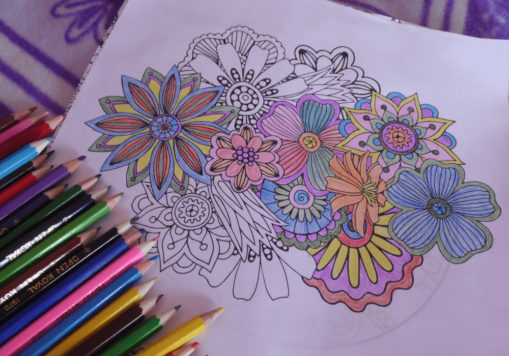 floral coloring page and pencils