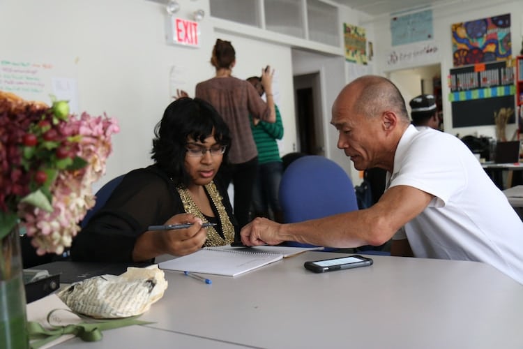 man teaching woman personal development goals