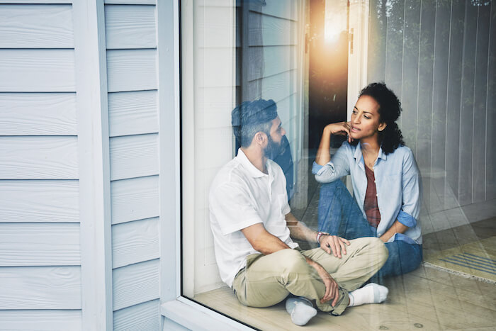couple talking on porch getting to know you questions