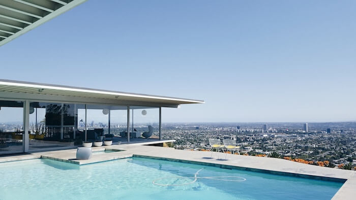 modern house overlooking city money quotes