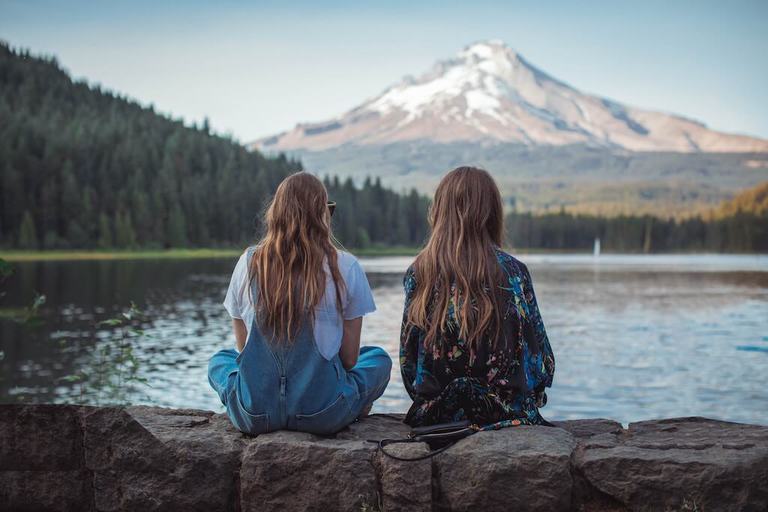 two women looking at mountain, one-sided friendship