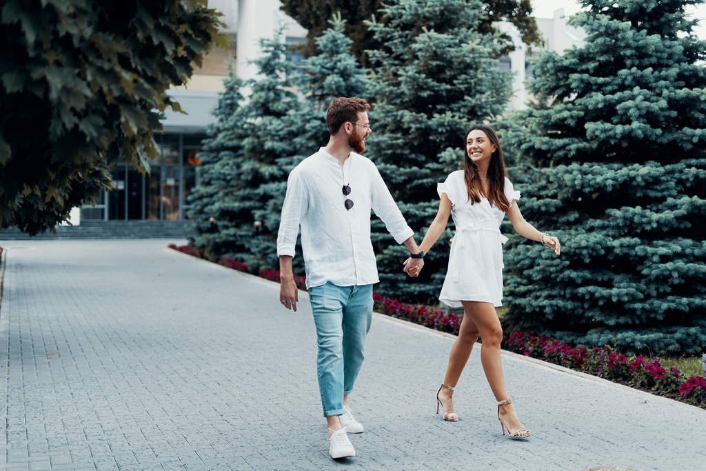 couple walking together how to be assertive in a relationship