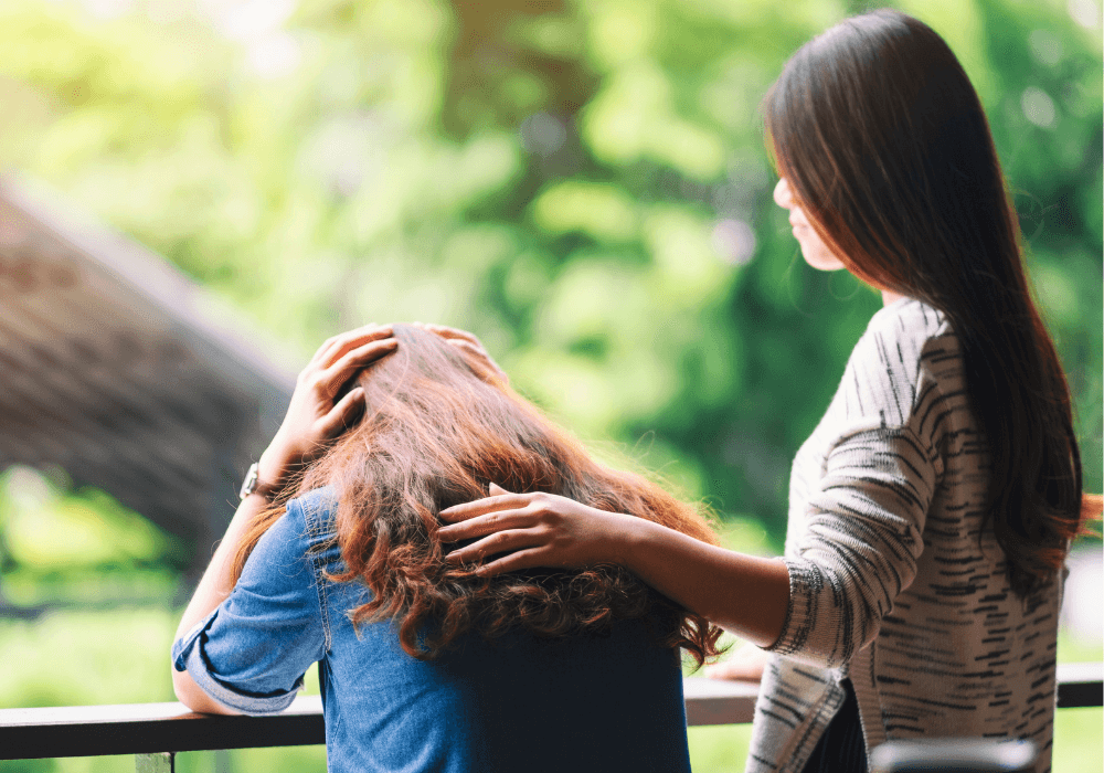 friend offering comfort, encouraging words for someone who is stressed out