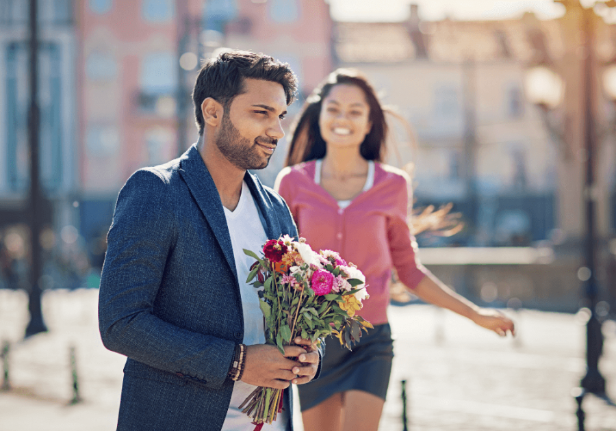 man bringing flowers to woman dating tips for men