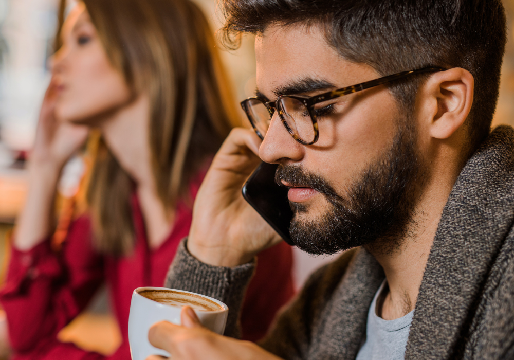 man on the phone neglecting partner not feeling like a priority in a relationship quotes