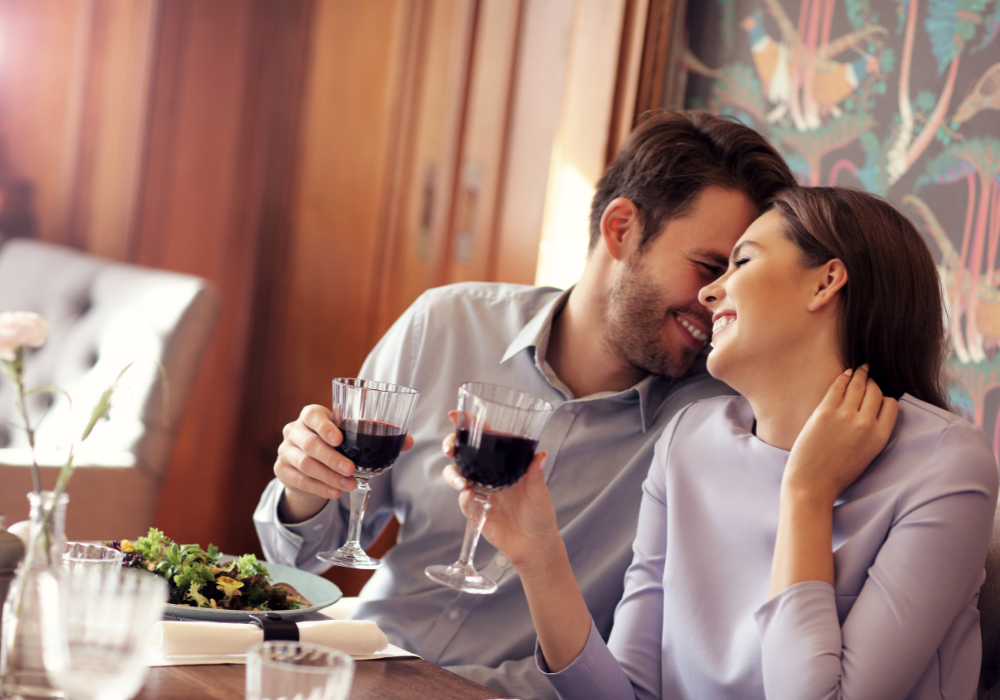 couple being sweet having dinner signs he will leave his wife for you