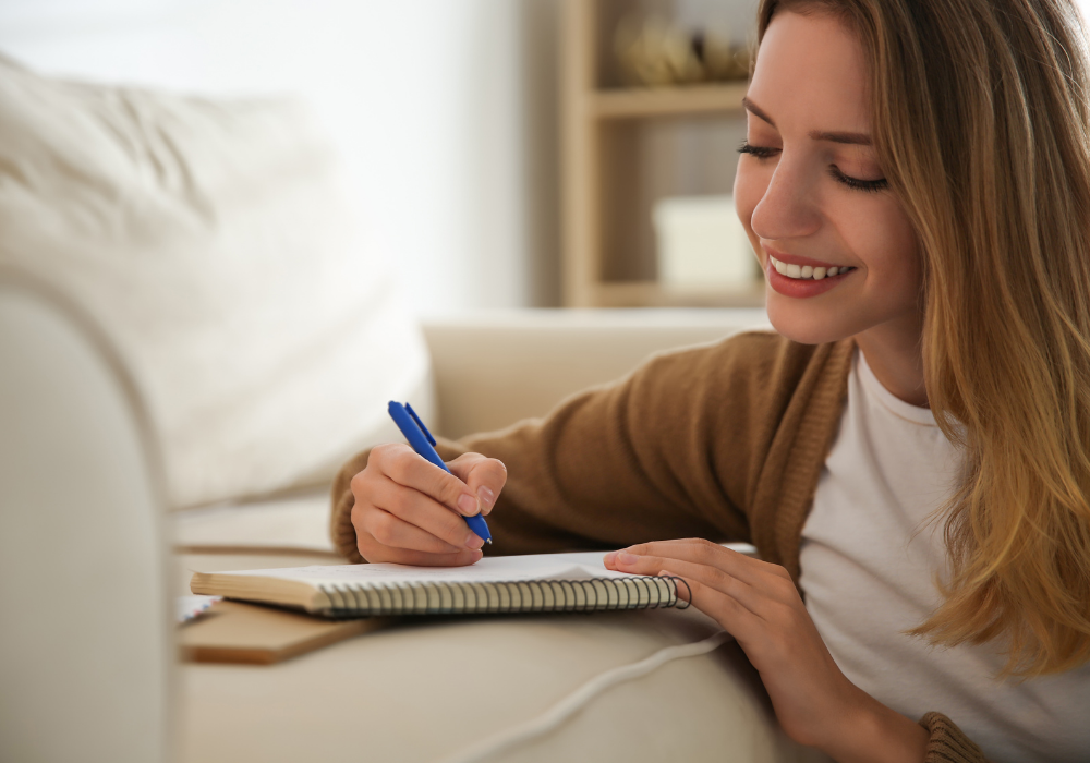 woman writing a poem love poems for your boyfriend that will make him cry