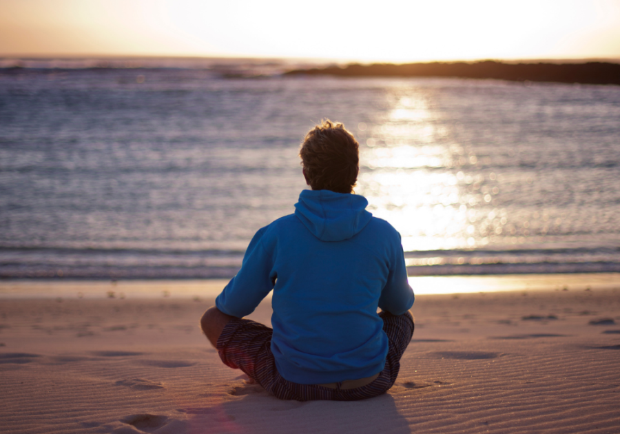 man by the beach thinking of himself self-awareness activities