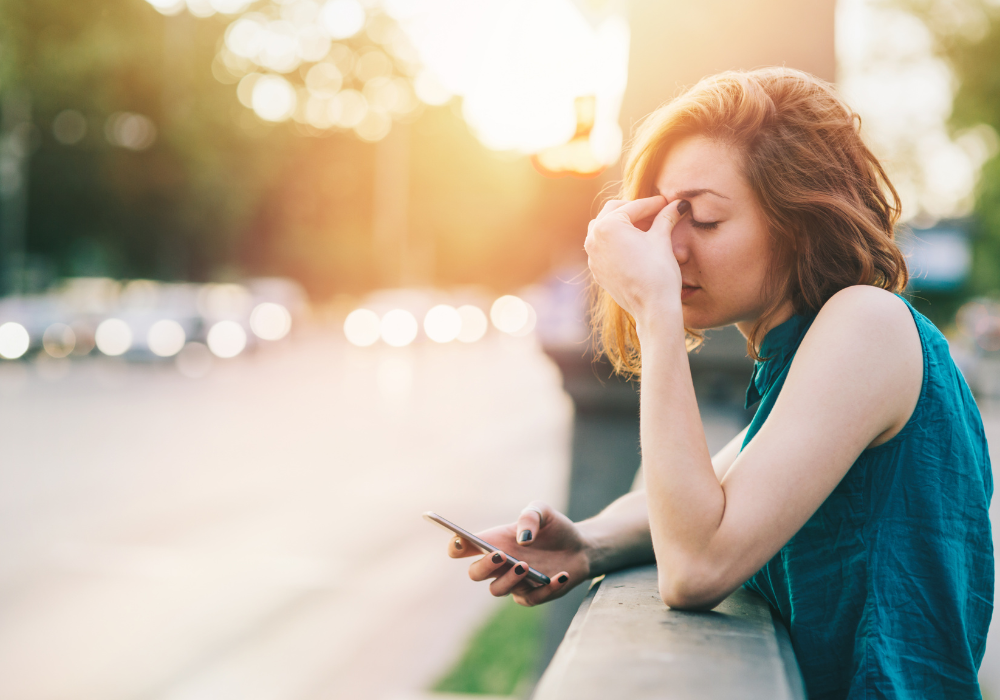 woman having problems with her phone what ghosting says about you