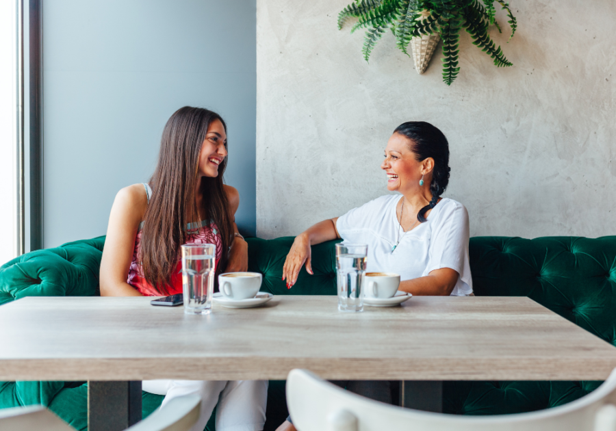 two women having coffee questions to ask your mom