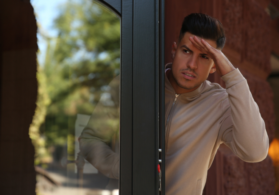 man trying to see something from afar when a narcissist sees you have moved on