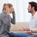 couple arguing sitting together stages of a dying marriage