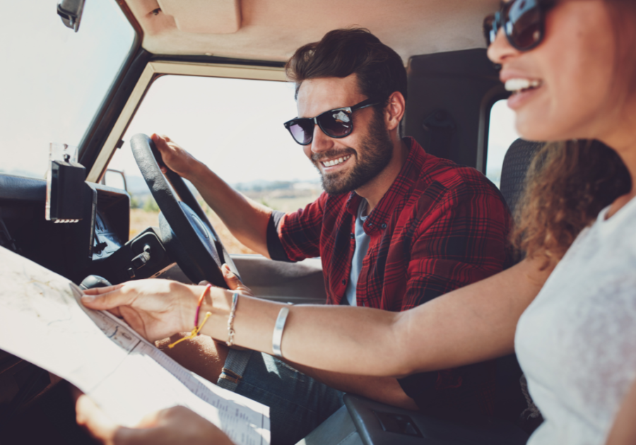 couple in car driving with map INFJ and INTJ Relationship compatibility