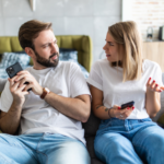 couple arguing over something signs he has multiple partners