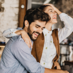 woman sitting on mans lap Open-Ended Questions to Ask a Girl