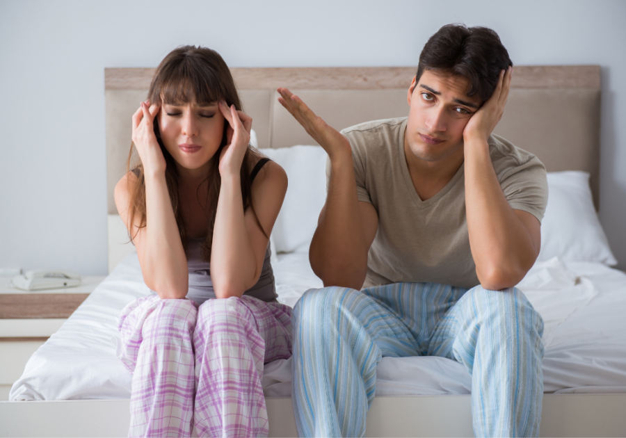 couple sitting on end of bed When To Walk Away From A Sexless Marriage