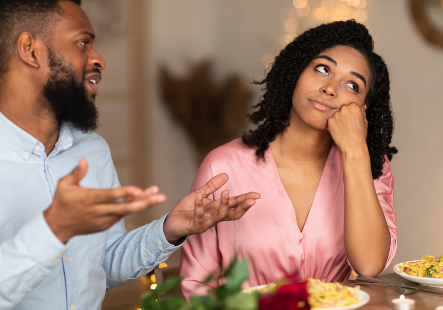 couple talking at dinner Signs That Your Girlfriend Isn't Sexually Attracted to You 