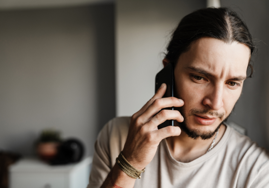man on phone looking concerned Woman Has Multiple Partners