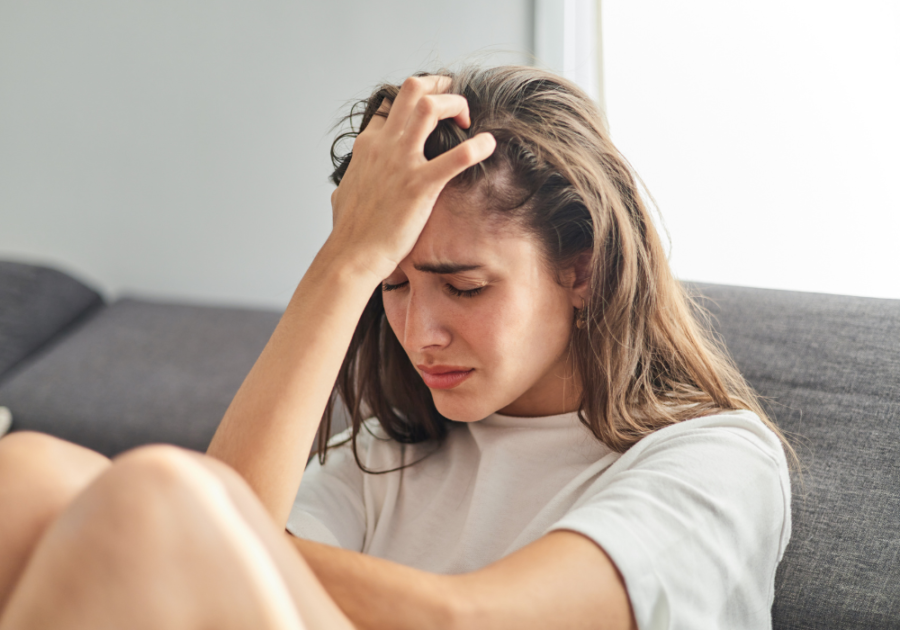 woman crying on sofa how to heal after being cheated on