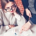 man pointed to paper with woman signs your doesn't respect you