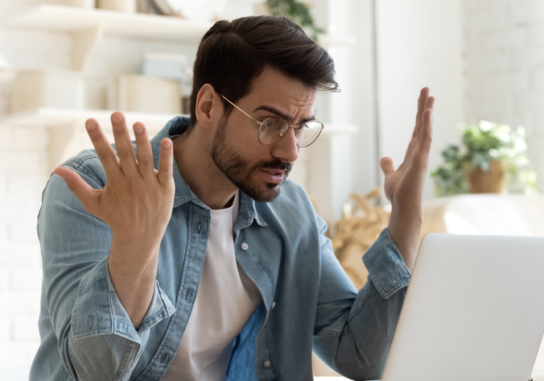 man with hands raised frustrated Signs of Anger Issues in Men