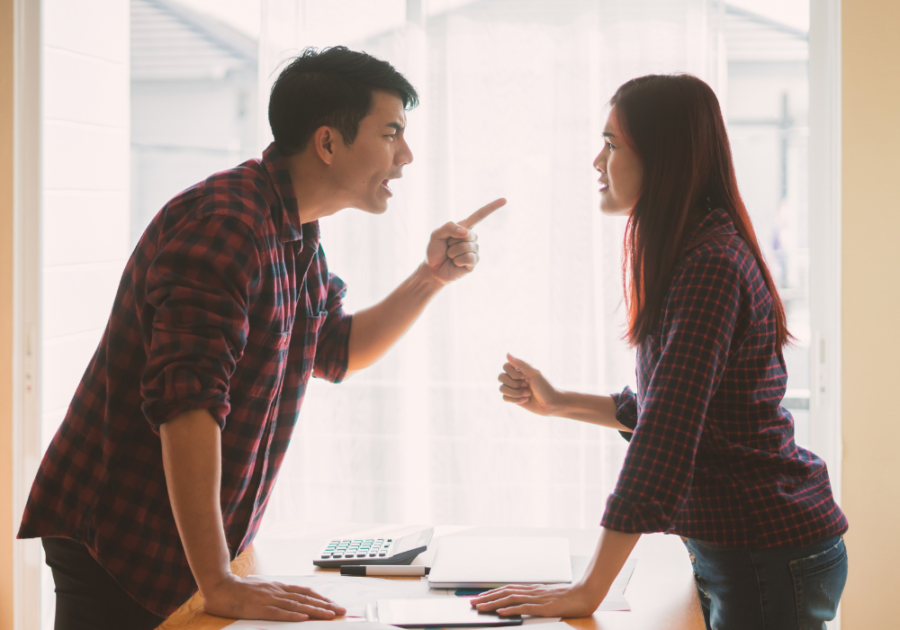 man point finger at woman Signs of Anger Issues in Men