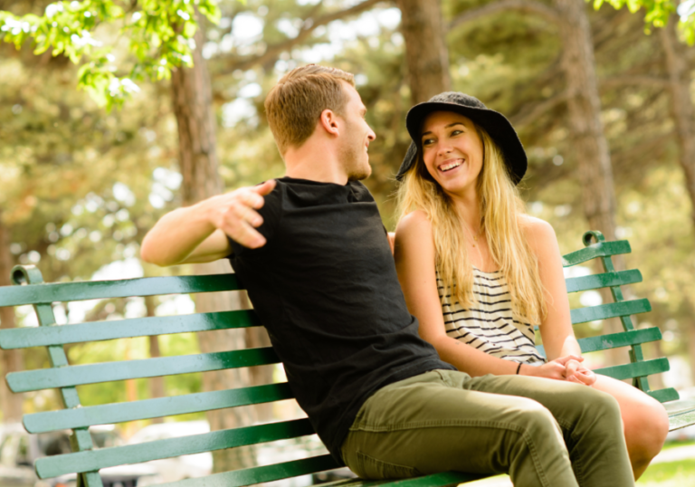 couple sitting on bench Couple Questions Game