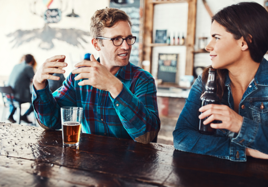 couple talking at bar responses to pick up lines