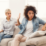 woman arguing while sitting on sofa Smart Replies to Rude Comments