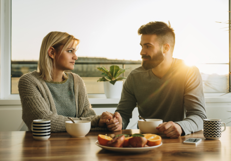 couple sitting a breakfast 80/20 Rule in Relationships