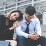 woman leaning on man at train station Signs You Are Forcing a Relationship