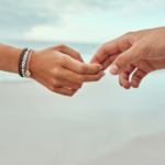 Couple holding hands How to Emotionally Detach from Someone