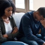 couple sitting on sofa man is crying Boyfriend Cheated on Me