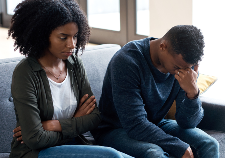 couple sitting on sofa man is crying Boyfriend Cheated on Me