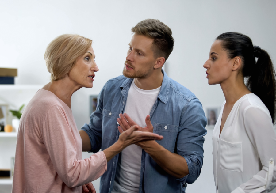 older woman talking to younger couple How to Make a Narcissist Respect You