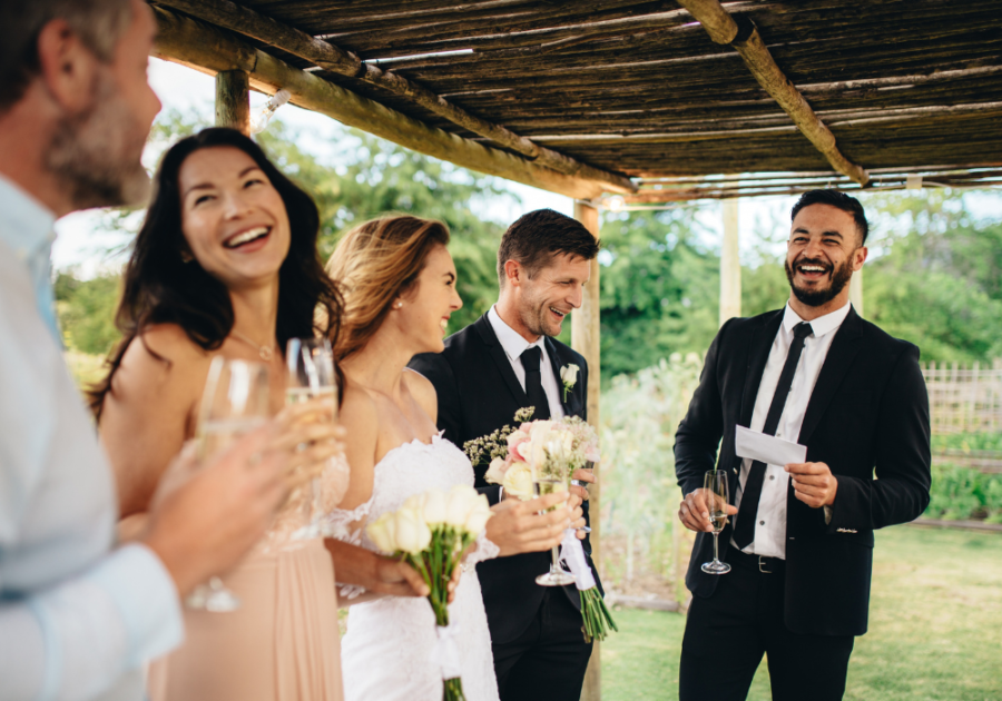 wedding party group drinking and laughing Funny Marriage Advice for Newlyweds