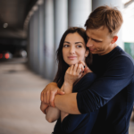 man hugging woman tightly Signs of Broken Men