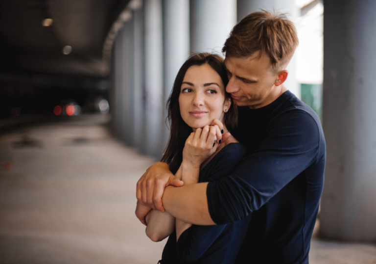 man hugging woman tightly Signs of Broken Men