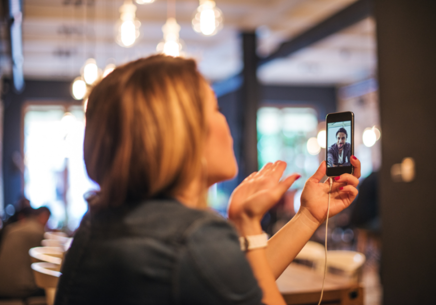 woman talking on face time call Long-Distance Relationship
