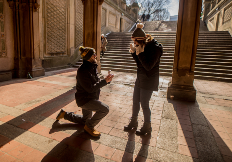 man kneeling in front of woman outdoors Wife Material