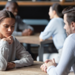 couple sitting at table sociopath weaknesses