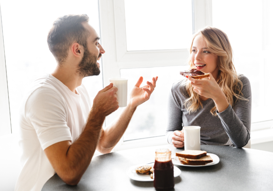 couple sitting at breakfast table Couples Quiz Questions