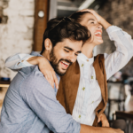 woman sitting on man's lap Funny Couples Quiz