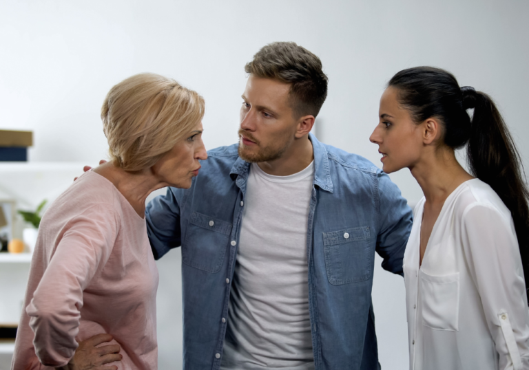 couple talking to older woman Signs Your Husband Puts His Family First