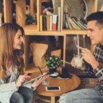 couple sitting for coffee talking Things to Talk About with Your Crush