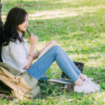 woman sitting by tree writing Love Poems For Crush