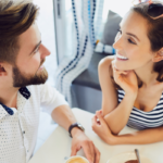 couple sitting close talking What to Talk About With Your Girlfriend