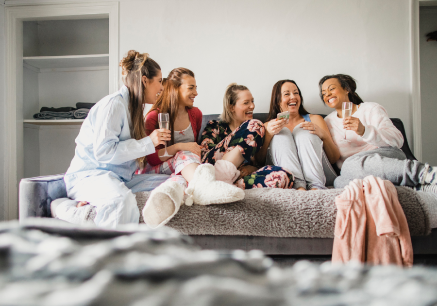 group of women sitting on sofa girls night questions